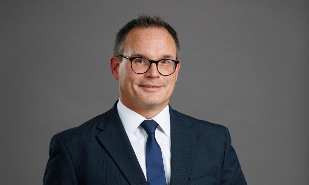 Jörn Manhart, DLA Piper.